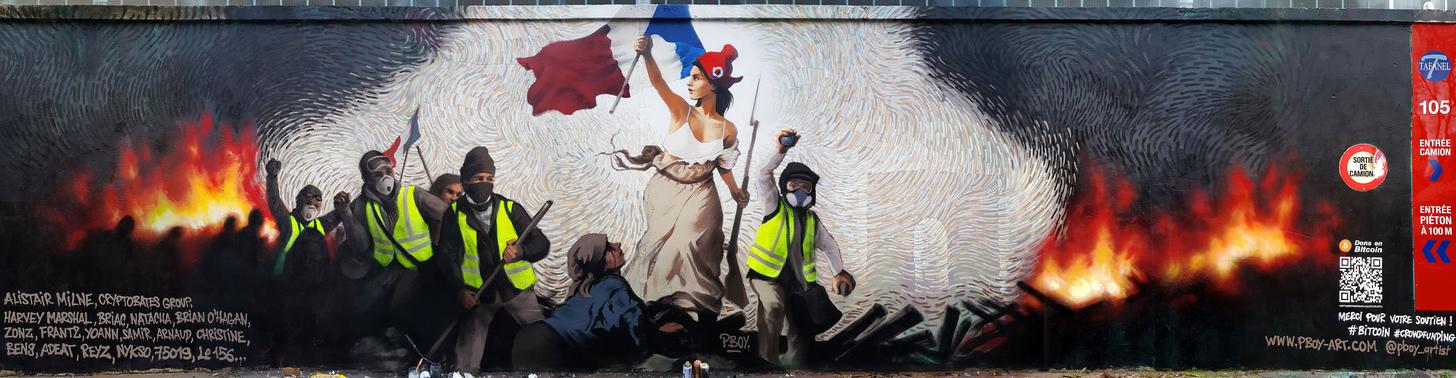 Street Artist Hides $1,000 in BTC Inside a Mural Depicting Paris Protests